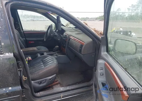 1999 Jeep Grand Cherokee Limited из США, поврежденный, VIN 1J4GW68N5XC702303